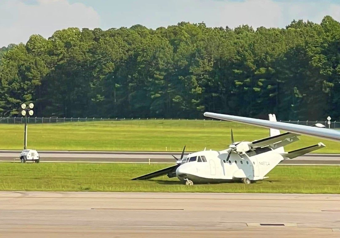NTSB  Preliminary Report :  Visibly  upset  about  the  hard  landing  ,  Co-Pilot (SIC)  removed his headset , apologized , and departed the airplane midair  via  the  aft  ramp door.