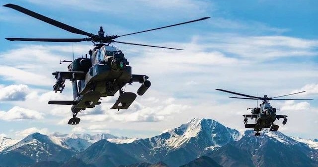 U.S. Army grounded its aviation units for 24 hours after two AH-64 Apache helicopters collided Thursday in Alaska.