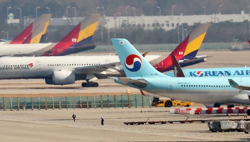 European Commission  Says , Korean Air's  Bid  to  Acquire  Rival Asiana  May  Restrict  Competition.