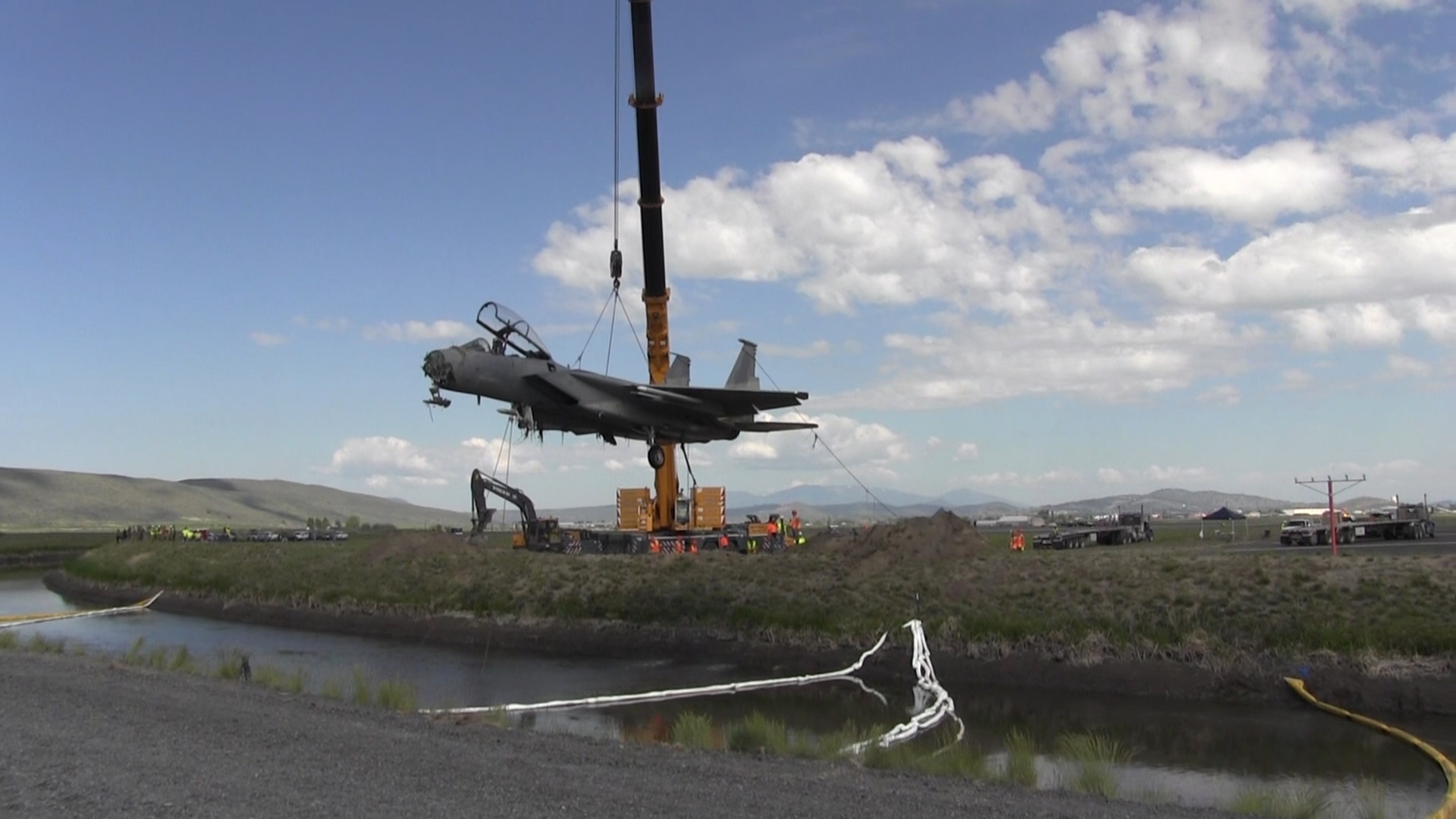 Airmen From The Disabled  Aircraft  Recovery Team  Recovered The U.S. Air Force F-15D aircraft From  Irrigation canal  Of  Klamath Falls. 
