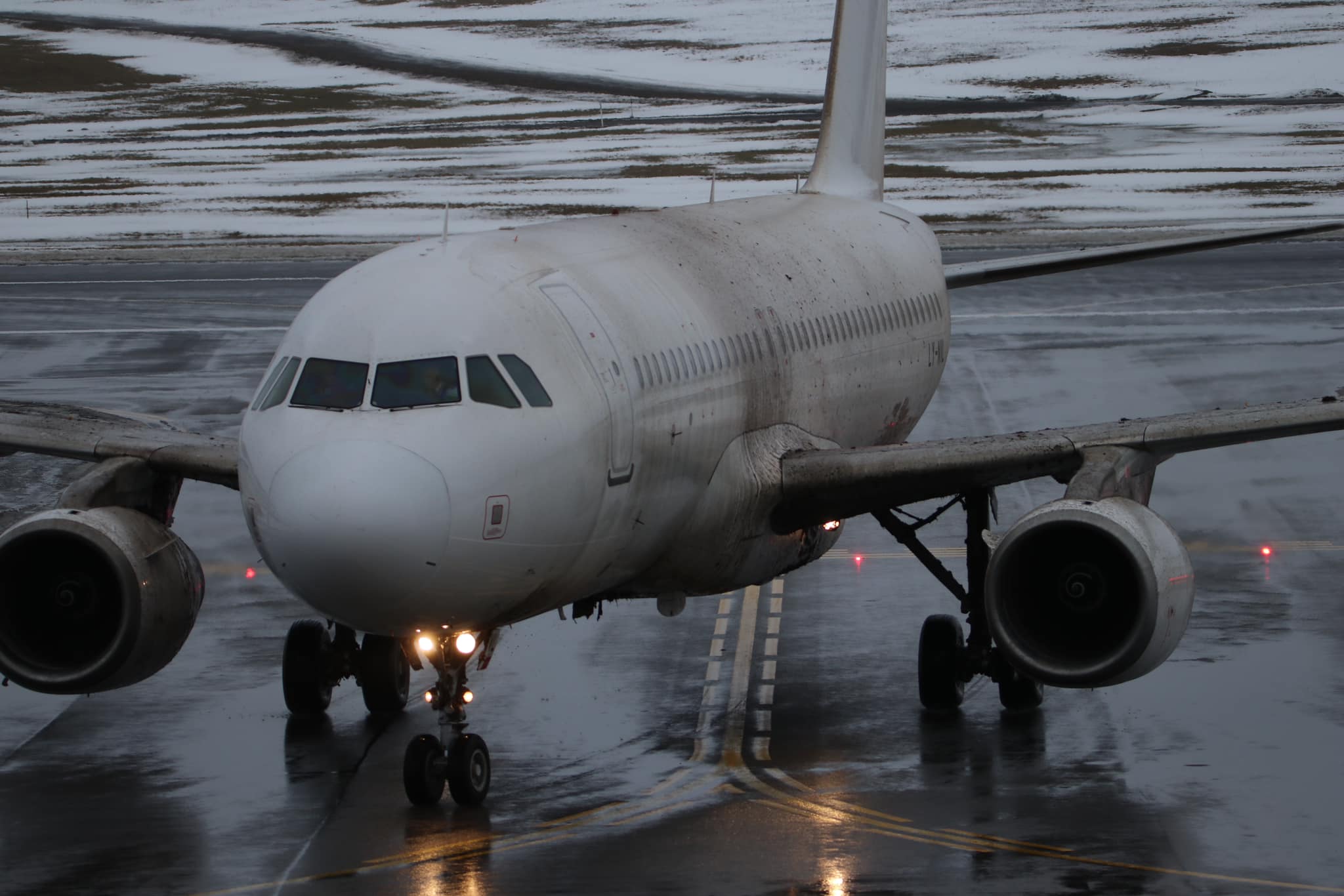 Auto Recovery Of  An  Avion Express Plane That  Skidded  Off  The  Runway  At  The Vilnius airport.