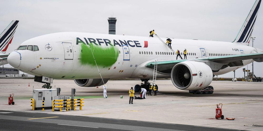 Conviction : Greenpeace Activists are banned  From  Appearing  at  Roissy-Charles-de-Gaulle  and  Le Bourget airports  for  three years For partially repainting an Air France plane green.