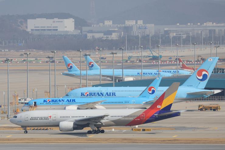 Eyes on U.S. Department of Justice, after Korean Air gets EU approval for Asiana merger.