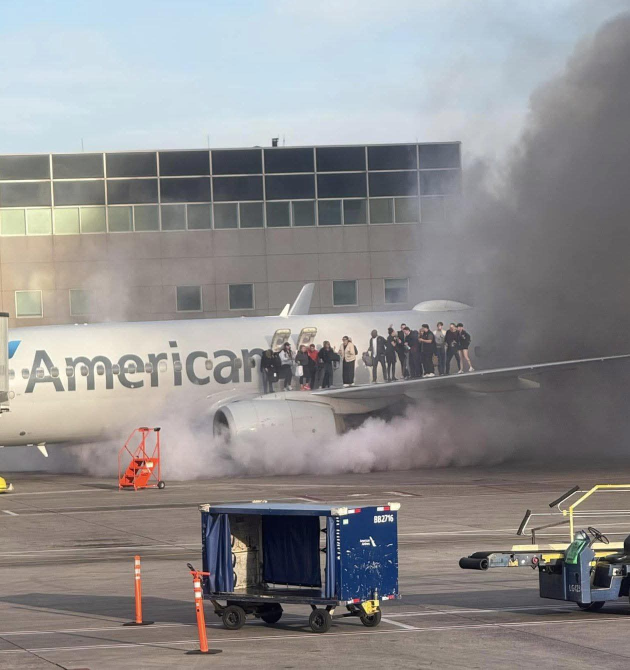 There were flames, and the windows began to bubble and melt, said a Passenger after being evacuated from American Airlines flight 1006 at Denver. 