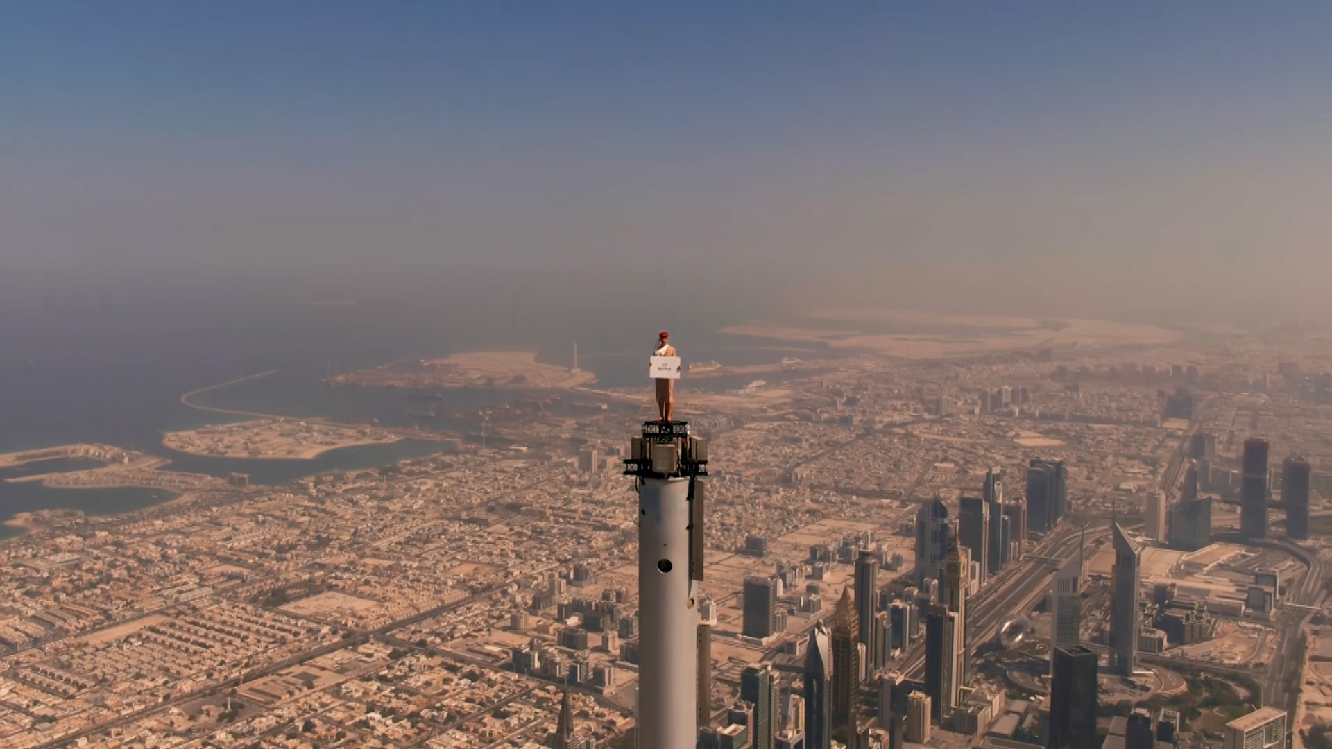 Why  did  Dubai's  Emirates Airlines  Put  one of  it's  cabin crews on the tip of the  Burj Khalifa ? 