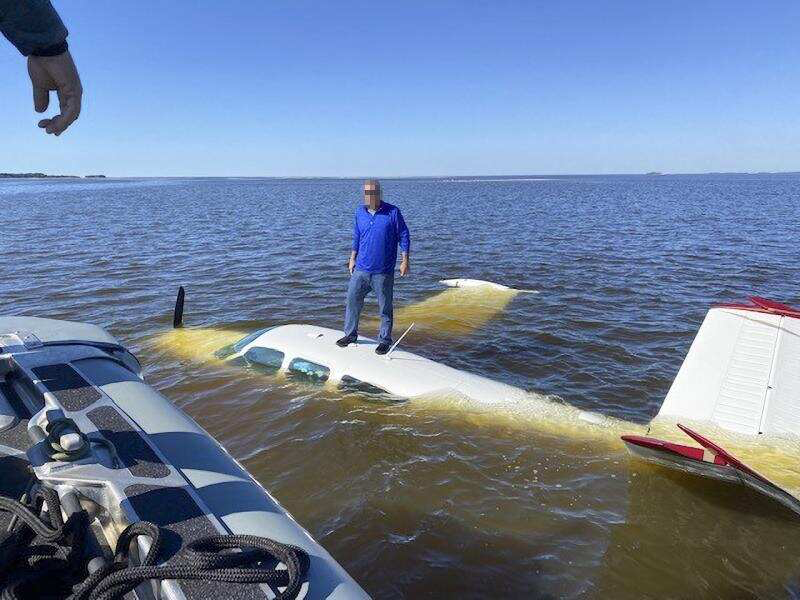 Pilot  of  a  Sinking  Beechcraft  Bonanza   aircraft  was  rescued  off  the  coast  of  Cedar  Key  ,  Florida  .